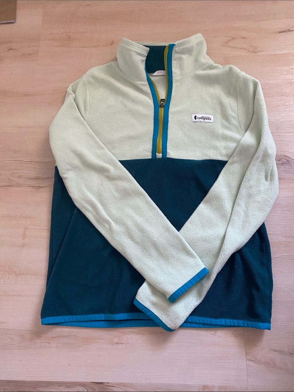 Cotopaxi Half-Zip Fleece Pullover in Light Green and Teal